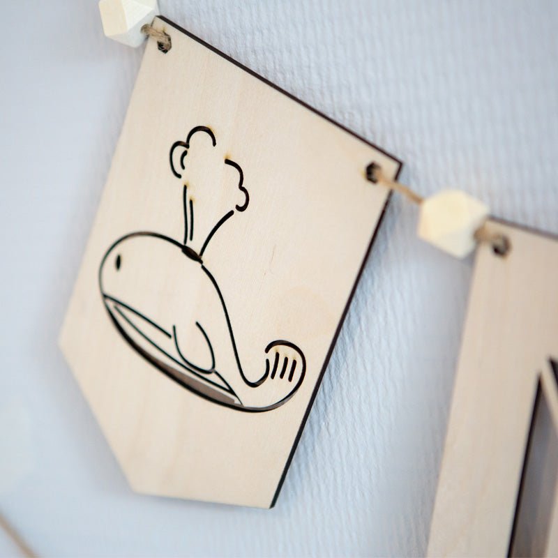 Gepersonaliseerde houten slinger - Creating adventure
